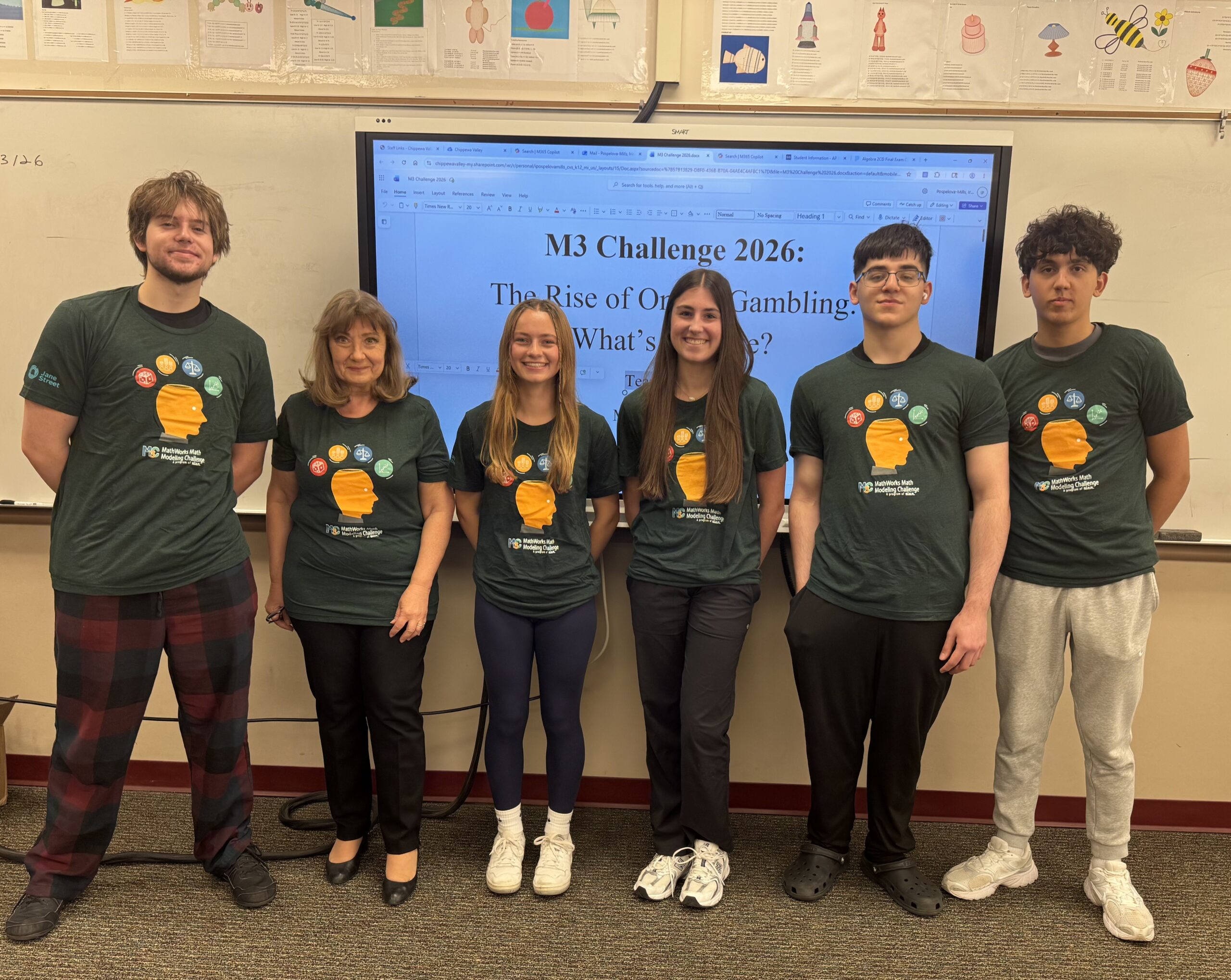 5 students looking into the camera